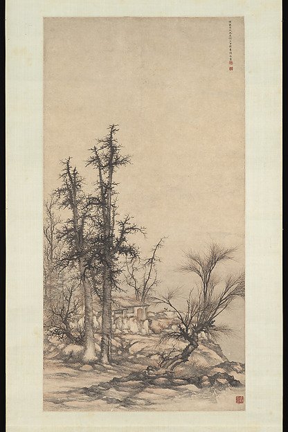 Small dwelling in a dense grove of trees