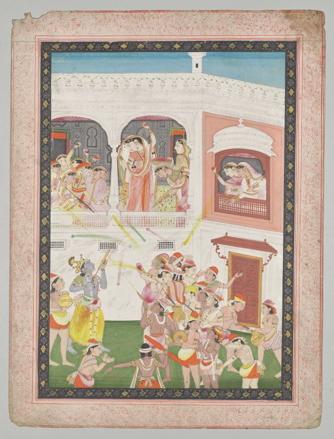 Radha and Hindu God Krishna celebrating the festival Holi