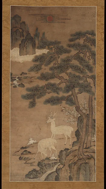 Deer amid pines